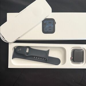 Apple Watch in Space Black with Matching Silicone Sport Band